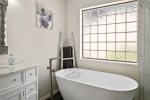 The classic bathtub is perfect for soothing soaks
